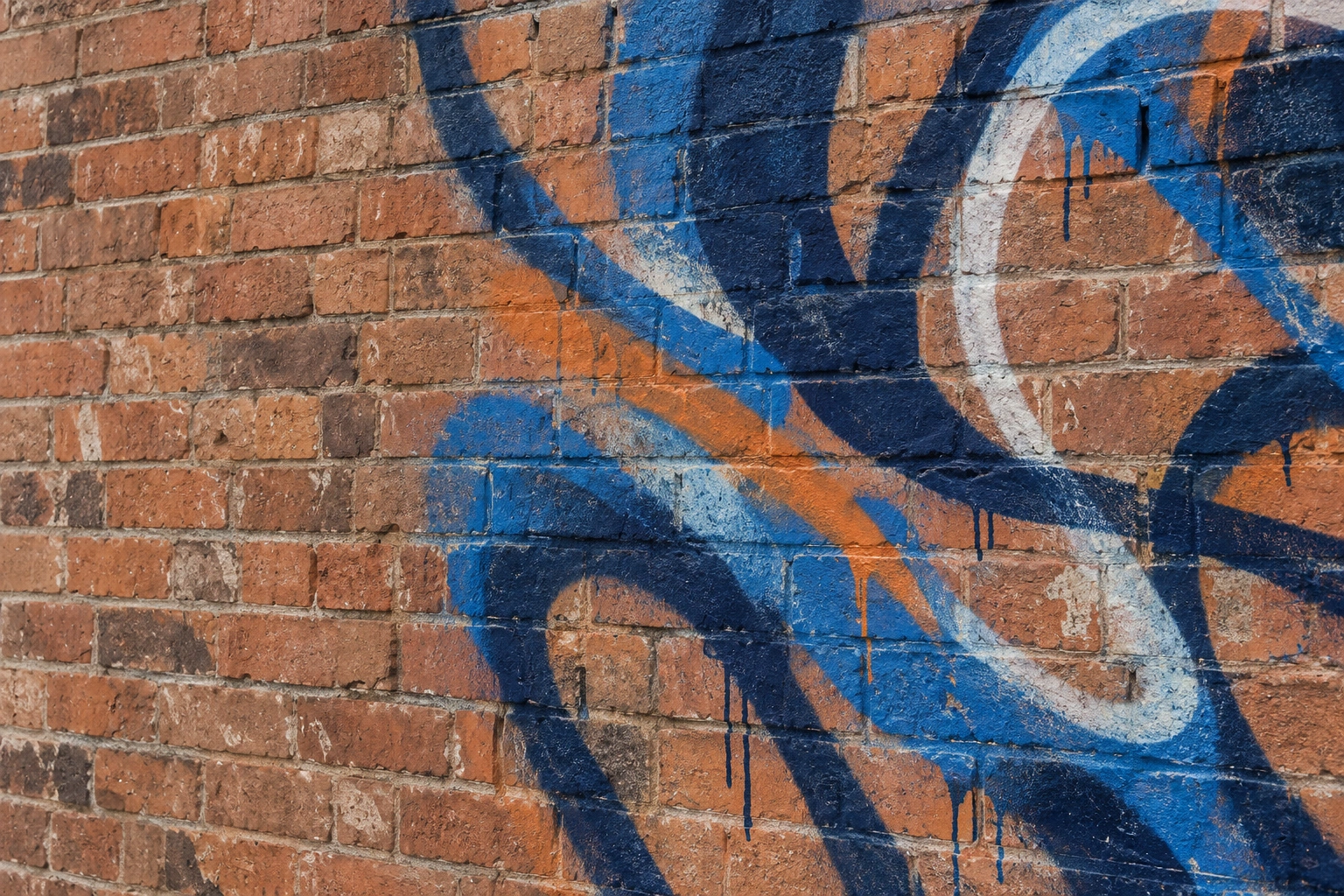 AI-generated image of original abstract spray paint on a textured brick wall
